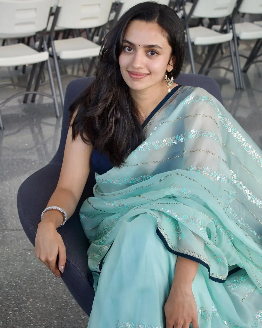 malayalam actress malvika nair in green saree sleeveless blue blouse